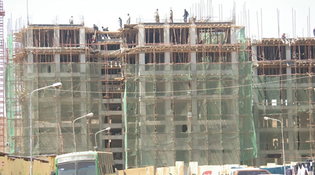 Construction of new houses is growing at 7.5 percent of government targets with only 15,000 new units in 2013 against a target of 200,000 housing builds a year in the city. Photo/XINHUA