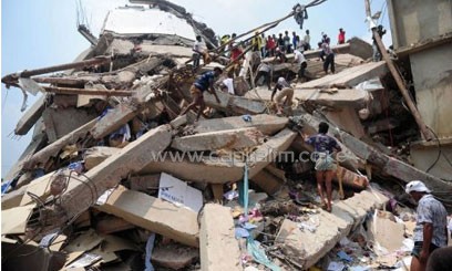 Volunteers and rescue workers search for survivors in the collapsed building in Savar. Photo/ AFP