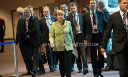 German Chancellor Angela Merkel arrives for a press conference/AFP