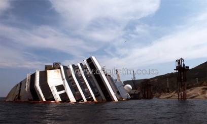 The Costa Concordia cruise ship lies in the water on July 7, 2013/AFP