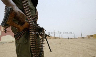 A Malian soldier partrols in the streets of Kidal on May 26, 2006/AFP