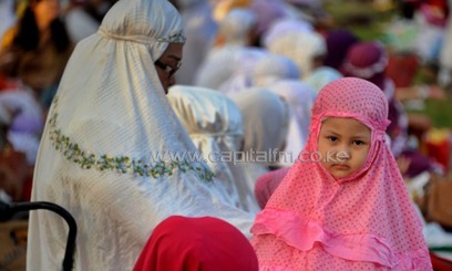Women and children preparing for the Eid celebrations/AFP