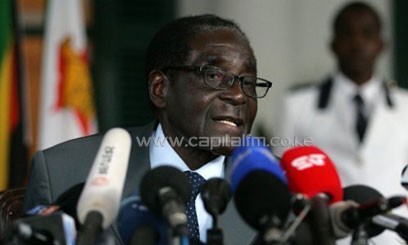 Zimbabwe's president and then Zanu PF presidential candidate Robert Mugabe speaks at a press briefing at the State House in Harare on July 30, 2013/AFP