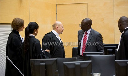 Odinga is later seen correcting his statement after Ruto whispered to him the words "peaceful mass action."/ICC