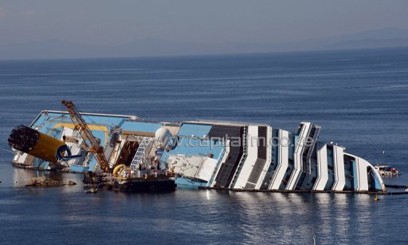 The 114,500-ton luxury liner has been lying on its side near Giglio since it hit rocks in January 2012/AFP
