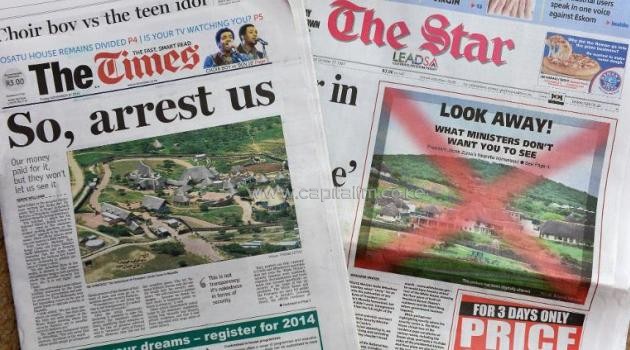 The covers of two local South African newspapers, pictured on November 22, 2013, which defied government threats and published pictures of President Jacob Zuma's revamped private home/AFP