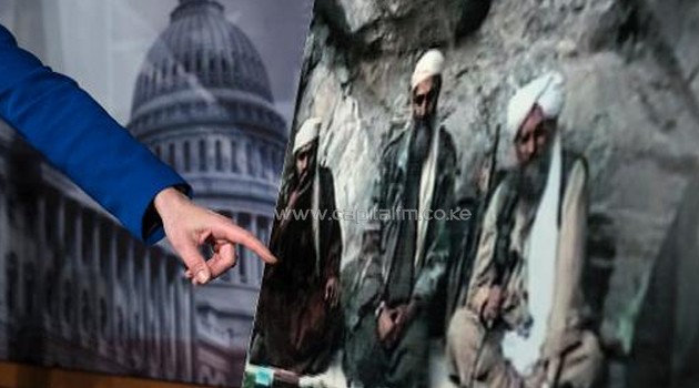 US Senator Kelly Ayotte points to a photo of Sulaiman Abu Ghaith (L) during a press conference on Capitol Hill on March 7, 2013 in Washington, DC/AFP