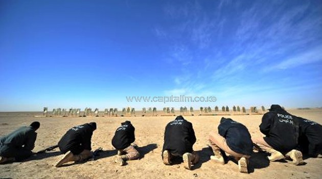 Afghan National Policemen (ANP) reload their weapons as they attend a shooting course at Camp Leatherneck on the outskirts of Lashkar Gah in Helmand Province on February 17, 2010/AFP
