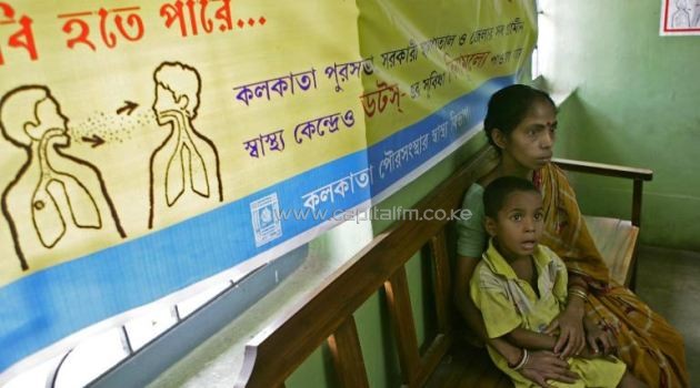 An Indian woman waits with her child, a tuberculosis patient, for a check-up at a Free Tuberculosis Hospital on the outskirts of Kolkata/AFP