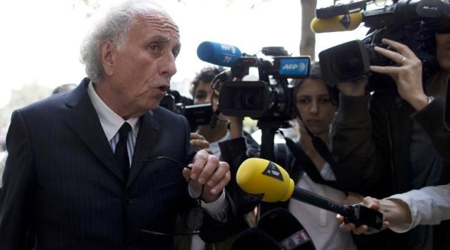 Gilles-Jean Portejoie, a lawyer representing Sid Ahmed Ghlam, an IT student suspected of planning a church attack in France, speaks with journalists as he arrives at the Hotel-Dieu hospital in Paris on April 24, 2015/AFP