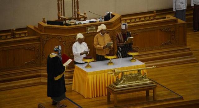 Htin Kyaw, a trusted friend of the Nobel laureate, takes power from the outgoing quasi-civilian government led by former general Thein Sein/AFP