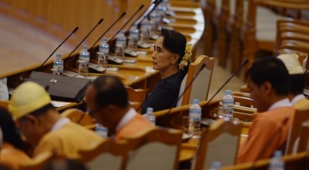 Myanmar democracy icon Aung San Suu Kyi and other members of the National League of Democracy party wait in the parliament before the historic presidential vote/AFP