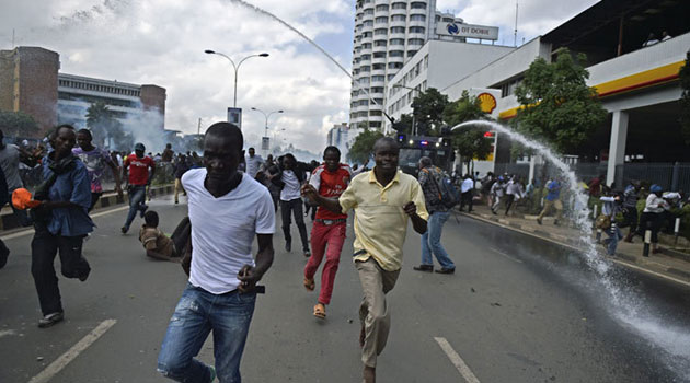 They were part of demonstrators who defied a police warning not to take part in the demonstrations and were dispersed with teargas and water cannon/AFP