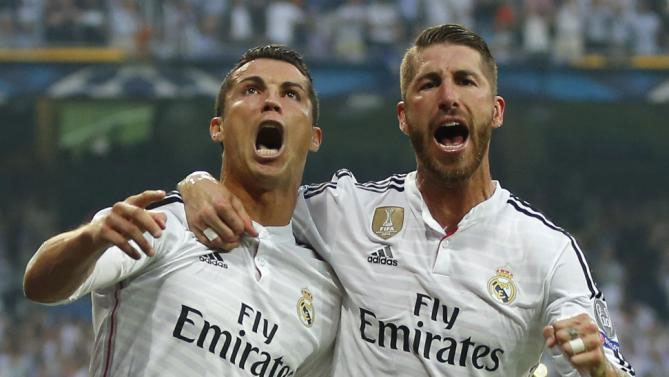 Cristiano Ronaldo (L) and Sergio Ramos celebrate one of his goals in Saturday\s 7-3 rout of Getafe at Santiago Bernabeu.