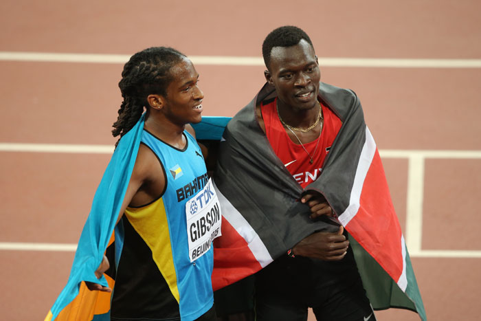 Nicholas Bett (right) and Bahamas bronze medallist, Jeffrey Gibson pose with their flags after the men 400m Hurdles final. PHOTO/IAAF/Getty FAP