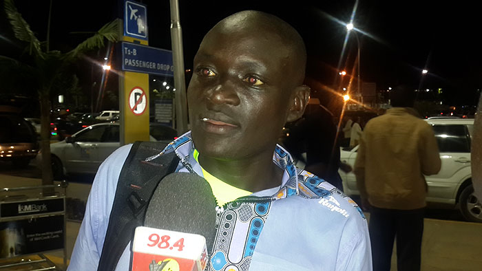 World marathon record holder, Dennis Kimetto, speaks at JKIA shortly before his departure for China. PHOTO/Alex Isaboke