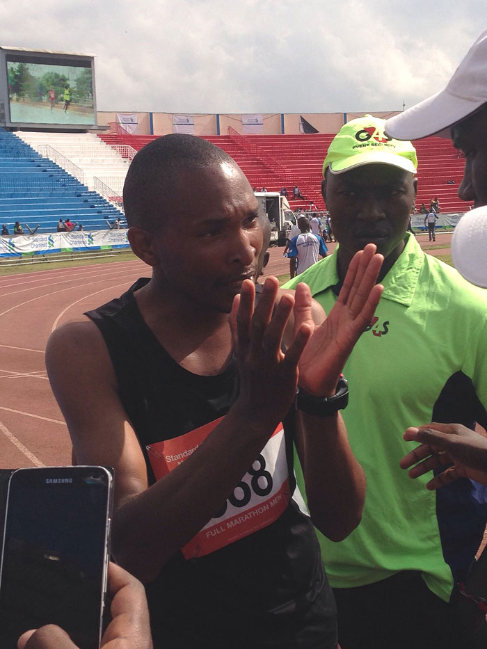 IT WASN'T ME! Julius Njogu tries to argue his case to race organisers before he was apprehended for trying to cheat his way to second. PHOTO/Joe Muchiri