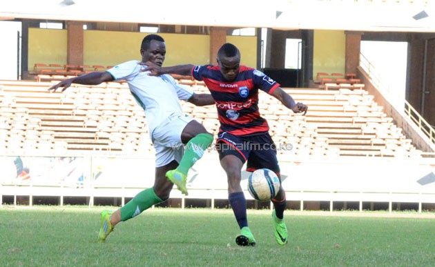 AFC Leopards winger Clifton Miheso on the ball against Harambee Stars U-20 skipper Amos Nondi during the friendly match at Kasarani Stadium on April 14th.PHOTO/Timothu Olobulu