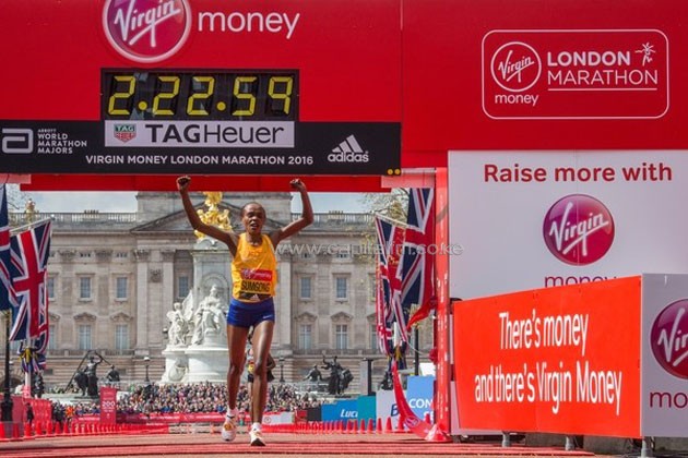 Jemima Sumgong cuts the tape to win the London Marahon/PHOTO-Organisers