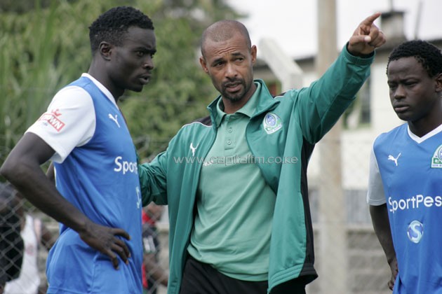 Gor Mahia head coach Jose Marcelo with new signing Baron Oketch.PHOTO/Raymond Makhaya.