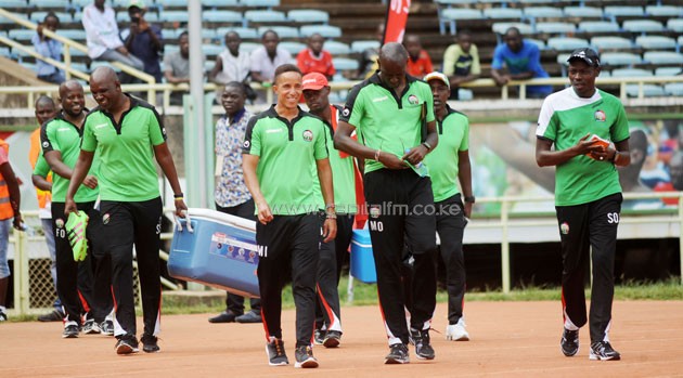 Harambee Stars coach Stanley Okumbi (right) leads his technical bench in Kenya's 2017 AFCON qualifier against Congo.PHOTO/Raymond Makhaya.