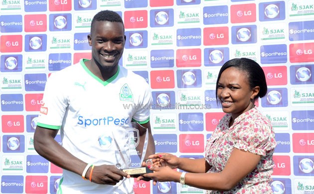Gor Mahia midfielder Khalid Aucho receiving the award.