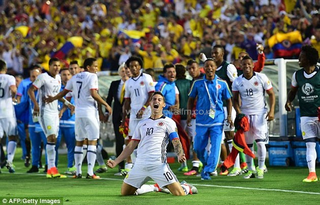 Colombia captain James Rodriguez celebrates after scoring his country's second goal against Paraguay.