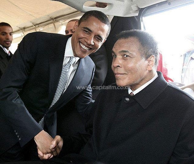 Obama (left, meeting Ali) still keeps a pair of Ali's gloves in the Oval Office underneath the photo of the then 22-year-old 'roaring like a lion over a fallen Sonny Liston.