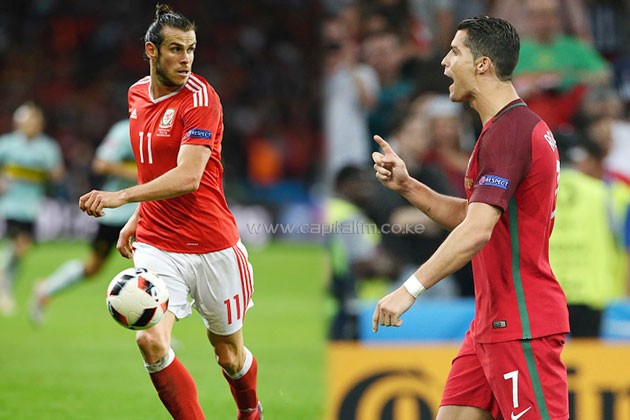 Portugal's Cristiano Ronaldo (L) comforts Wales player Gareth Bale after their Euro 2016 semi-final in France on July 6, 2016, won 2-0 by Portugal.PHOTO/AFP
