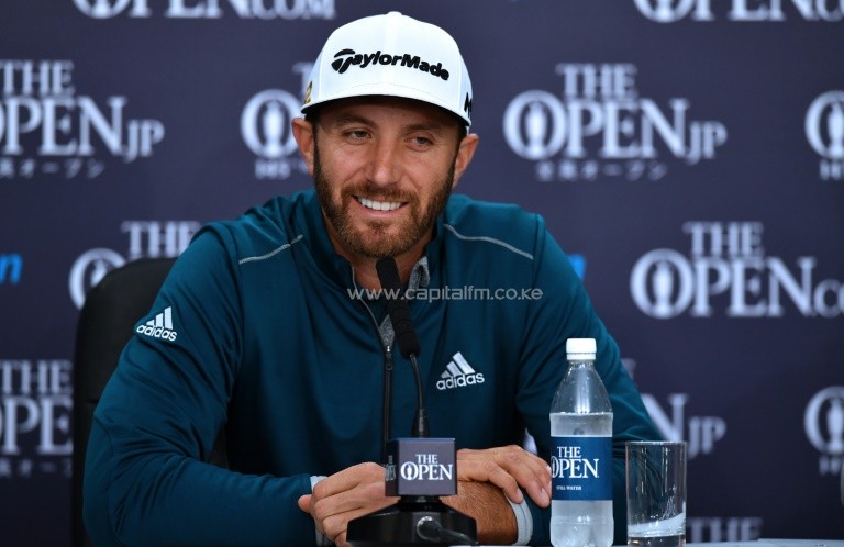 US golfer Dustin Johnson smiles as he speaks to members of the media at a press conference ahead of the 2016 British Open Golf Championship at Royal Troon in Scotlan. PHOTO/AFP.