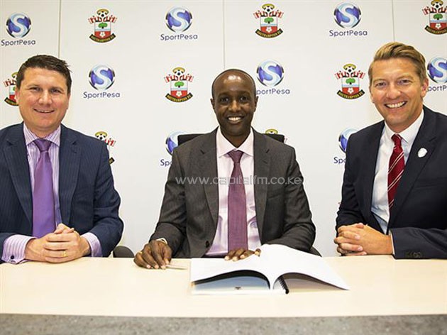 SportPesa CEO Ronald Karuri (center) with Southampton FC officials when signing the deal on Wednesday, July 27, 2015.