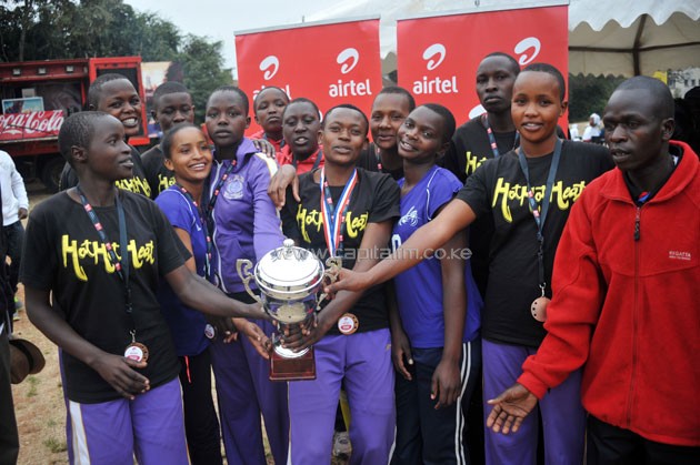 Soweto Academy volleyball team lifting the trophy after beating champions Kwanthanze in the finals.PHOTO/Raymond Makhaya.