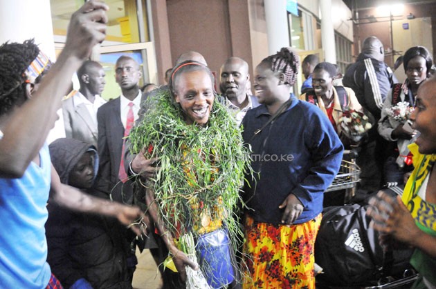 Marathon star Jemima Sumgong at the Jomo Kenyatta international Airport when she was accorded a warm reception.PHOTO/Raymond Makhaya.