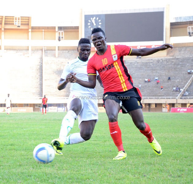 Musa Mohammed tackles Uganda Cranes' Kizito Luwagga.PHOTO/Timothy Olobulu.