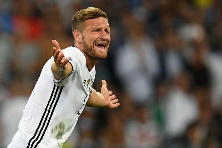 Shokdran Mustafi celebrates scoring a goal for Germany in a former match