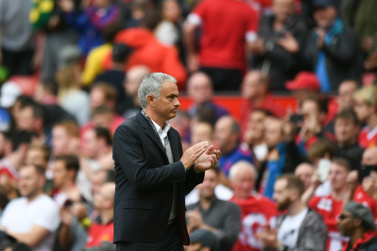Manchester United manager Jose Mourinho walks off after the final whistle during his side's English Premier League match against Leicester City at Old Trafford in Manchester, north-west England, on September 24, 2016
