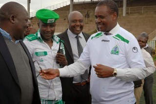 Nairobi Governor, Dr. Evans Kidero (right) with Gor Mahia's chief supporter, Jaro Soja (third right). The County boss says he has no authority to ban AFC Leopards or Gor from playing in Nairobi. PHOTO/Facebook