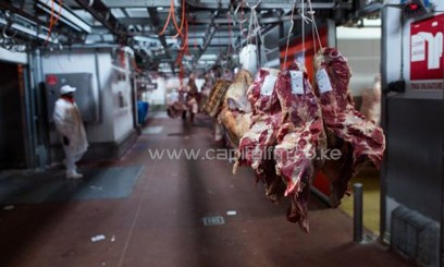 Beef hangs on hooks, December 17, 2012, at the international wholesale market in the southern Paris/AFP