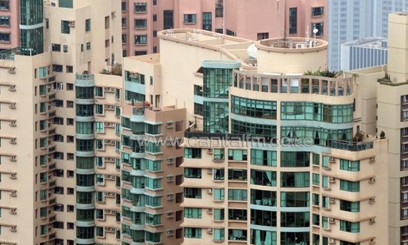 The tops of several luxury apartments in Hong Kong/AFP