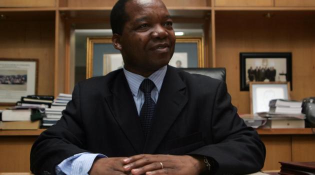 Zimbabwean economist John Mangudya who was appointed central bank governor poses in his office on March 24, 2014 in Harare/AFP