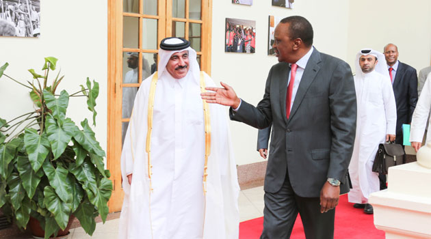 President Uhuru Kenyatta with Qatar Minister for Transport , Jassim Seif Ahmed Al Sulaiti when he called on him at State House, Nairobi/PSCU