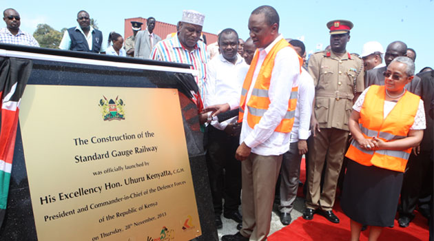 The President inspected a trial section of the SGR at Mtito Andei and later toured a plant for manufacturing rail sleepers and bridge sections/FILE