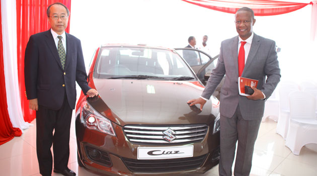 Koichi Suzuki, GM Middle East and Africa, Automobile Marketing Group , Suzuki Motors Corporation with Solomon Muturi, Managing Director CMC Motors/FILE