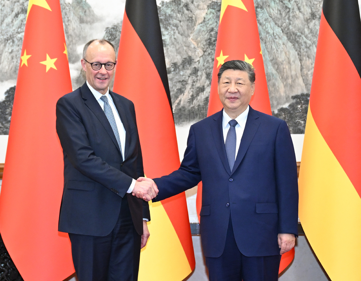German chancellor warns of trade imbalance with China during first Beijing trip