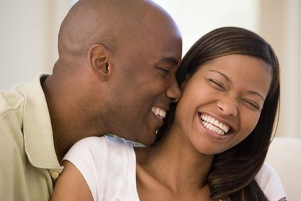 Couple in living room smiling