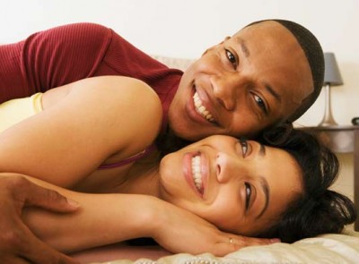 intimate-couple-bed-smiling_400x295_1