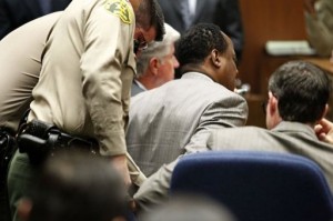 Dr. Conrad Murray is remanded into custody after the jury returned with a guilty verdict. A grim-faced Murray himself gave no reaction when the verdict was announced and judge Pastor ordered him remanded in custody pending a sentencing hearing on November 29. © AFP/Los Angeles Times/ Pool Al Seib