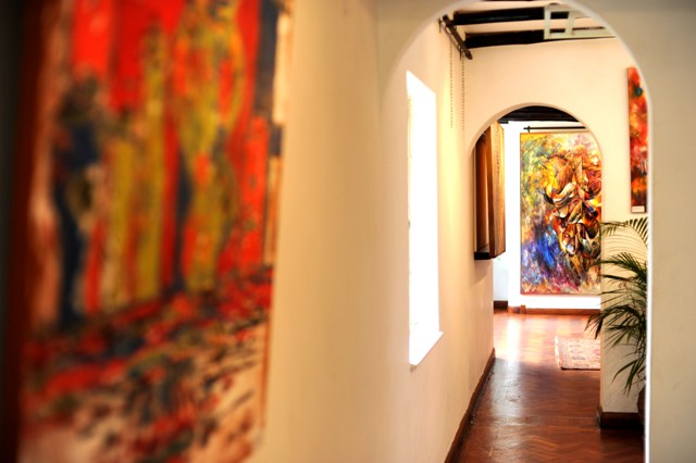 Congolese painter Bezalel Ngabo at Osteria Art Gallery 2012 photographed by Susan Wong