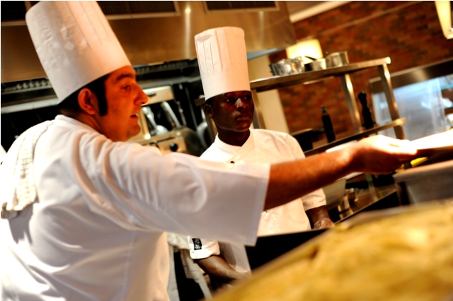 lucca at villa rosa kempinski chef silvio in kitchen