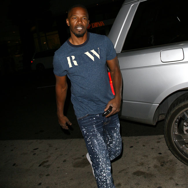 Actor Jamie Foxx dines out with a mystery woman at Mr Chow in Beverly Hills, CA